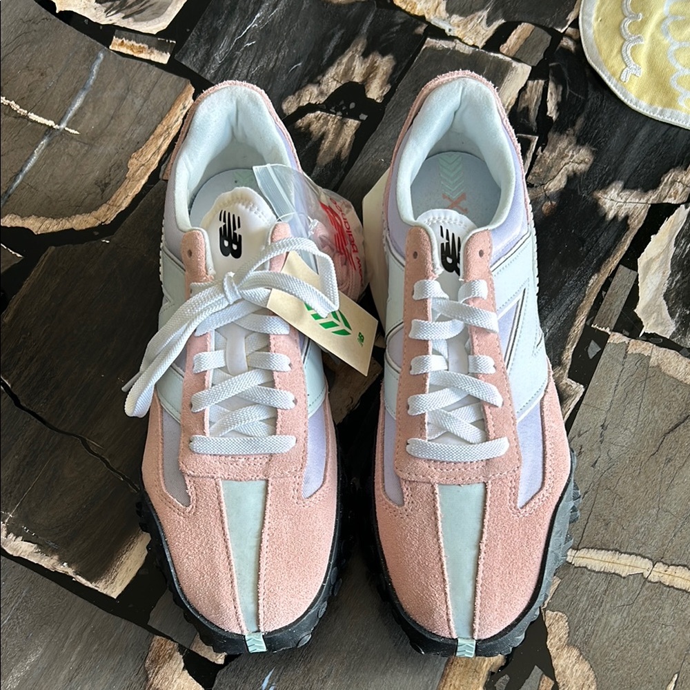 New Balance Women's size 11/men’s size 9.5 Pink and White Sneakers